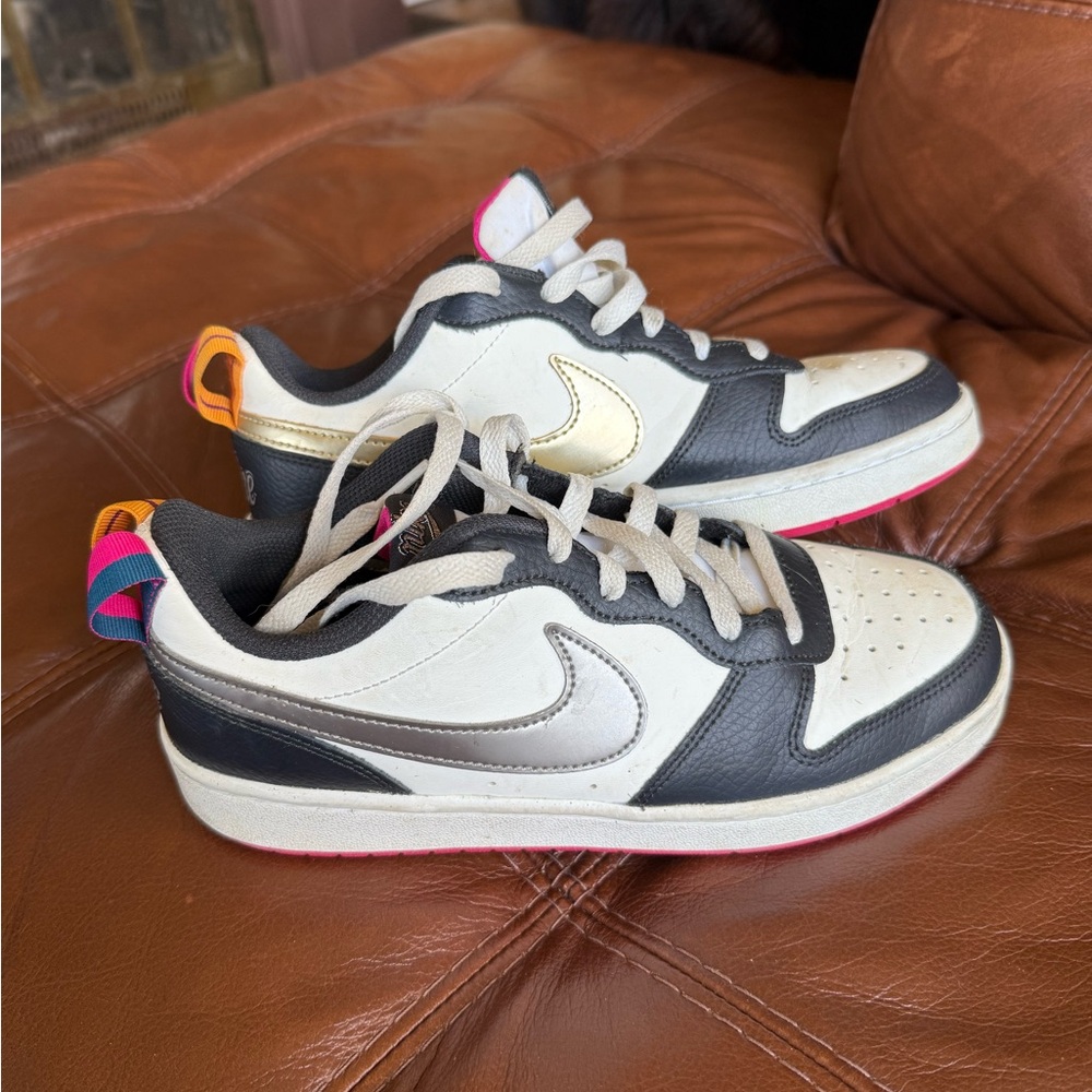 Nike Black and White Sneakers with Pink and Orange Details